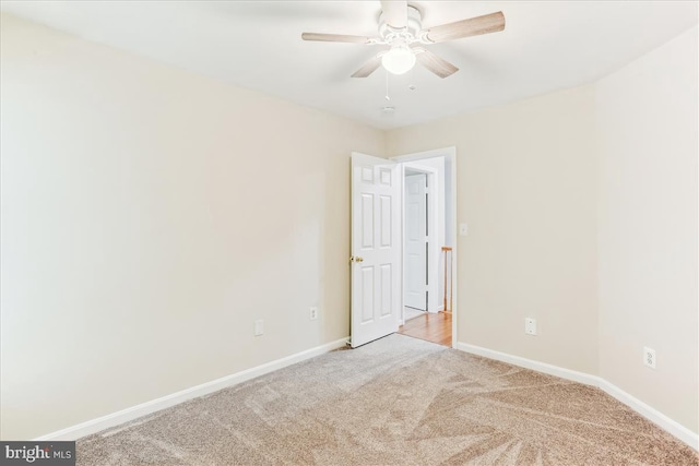 9409 Emory Grove Rd, Gaithersburg, MD 20877 - empty room featuring light carpet, a ceiling fan, and baseboards