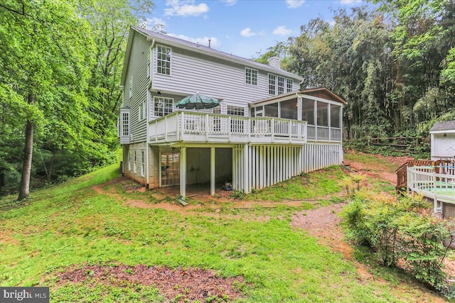 9409 Emory Grove Rd, Gaithersburg, MD 20877 - back of property featuring a sunroom, a chimney, a deck, and a yard