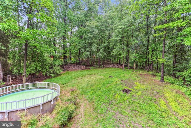 9409 Emory Grove Rd, Gaithersburg, MD 20877 - view of grassy yard with a forest view