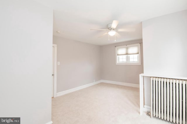 763 Humphreys Rd, Ardmore, PA 19003 - unfurnished room with radiator, ceiling fan, baseboards, and carpet floors