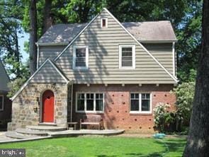 1412 N Wakefield St, Arlington, VA 22207 - view of front of house featuring a front lawn