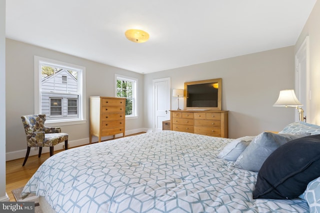 1412 N Wakefield St, Arlington, VA 22207 - bedroom with light wood finished floors and baseboards