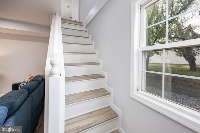 stairs featuring baseboards