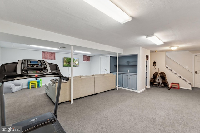 workout area with carpet flooring and visible vents