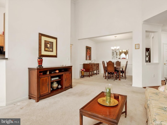 11110 Chambers Ct Unit N, Woodstock, MD 21163 - living area featuring crown molding, a chandelier, and light colored carpet