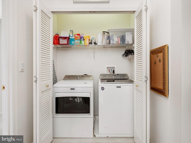 11110 Chambers Ct Unit N, Woodstock, MD 21163 - clothes washing area with laundry area and washer and clothes dryer
