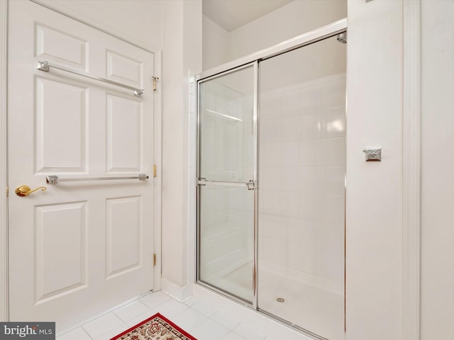 11110 Chambers Ct Unit N, Woodstock, MD 21163 - full bath featuring tile patterned flooring, baseboards, and a tile shower