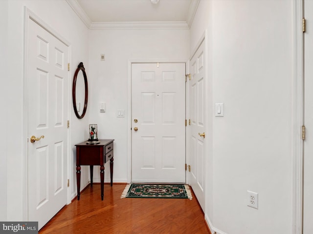 11110 Chambers Ct Unit N, Woodstock, MD 21163 - entryway featuring crown molding, baseboards, and wood finished floors
