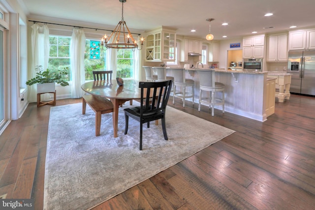 23280 Horse Island Rd, Lewes, DE 19958 - dining space with dark wood-style flooring, a chandelier, and recessed lighting