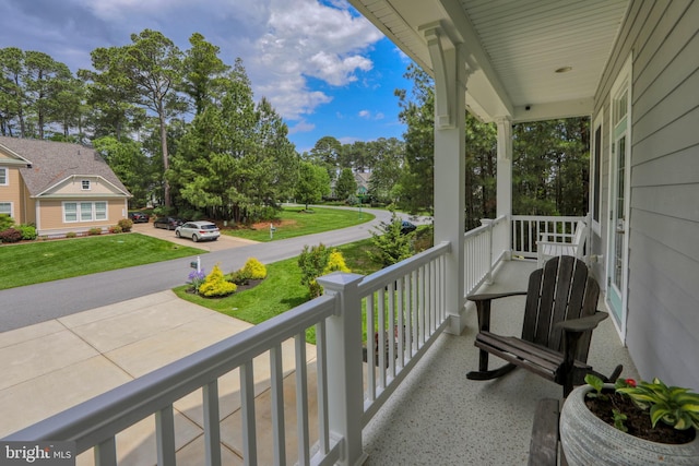 23280 Horse Island Rd, Lewes, DE 19958 - balcony featuring a porch