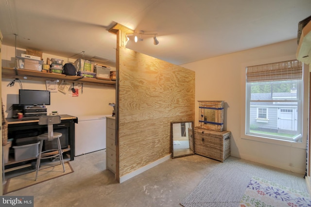 23280 Horse Island Rd, Lewes, DE 19958 - bedroom featuring a desk, concrete flooring, and baseboards