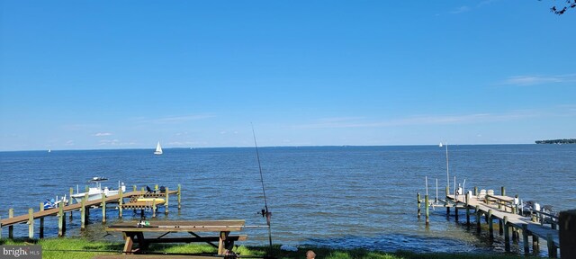 6555 Clagett Ave, Tracys Landing, MD 20779 - dock area featuring boat lift and a water view