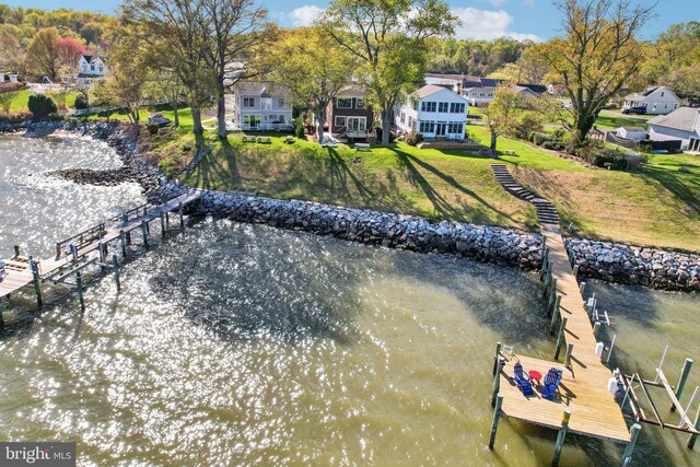 6555 Clagett Ave, Tracys Landing, MD 20779 - exterior space featuring a yard, a water view, and a residential view