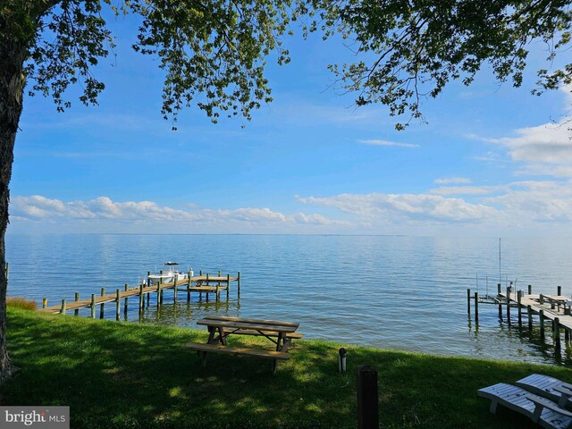 6555 Clagett Ave, Tracys Landing, MD 20779 - view of dock with a water view, a yard, and boat lift