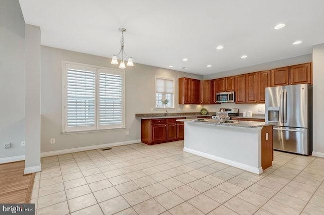 13404 Fieldstone Way, Gainesville, VA 20155 - kitchen featuring stainless steel appliances, a chandelier, baseboards, pendant lighting, and recessed lighting