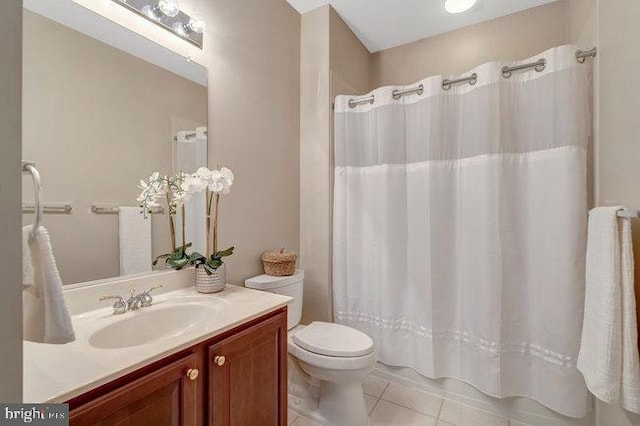13404 Fieldstone Way, Gainesville, VA 20155 - bathroom featuring tile patterned floors, vanity, toilet, and a shower with shower curtain