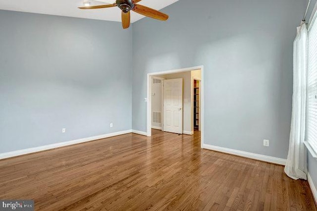 13404 Fieldstone Way, Gainesville, VA 20155 - spare room featuring ceiling fan, lofted ceiling, baseboards, and wood finished floors