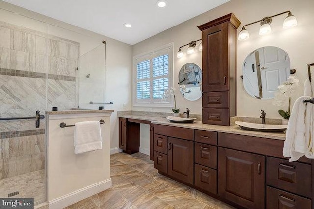 13404 Fieldstone Way, Gainesville, VA 20155 - bathroom with a walk in shower, double vanity, baseboards, and recessed lighting