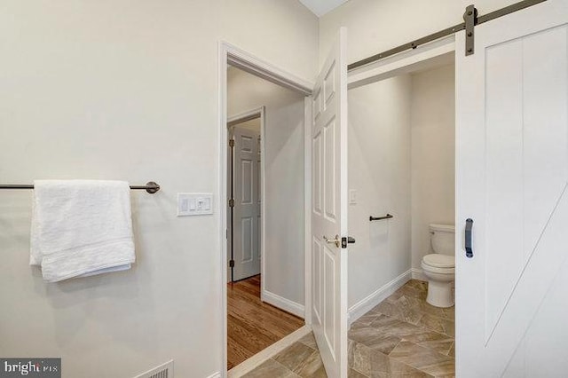 13404 Fieldstone Way, Gainesville, VA 20155 - bathroom with toilet and baseboards