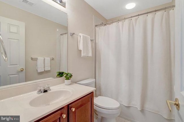 13404 Fieldstone Way, Gainesville, VA 20155 - full bathroom with vanity, toilet, and tile patterned flooring