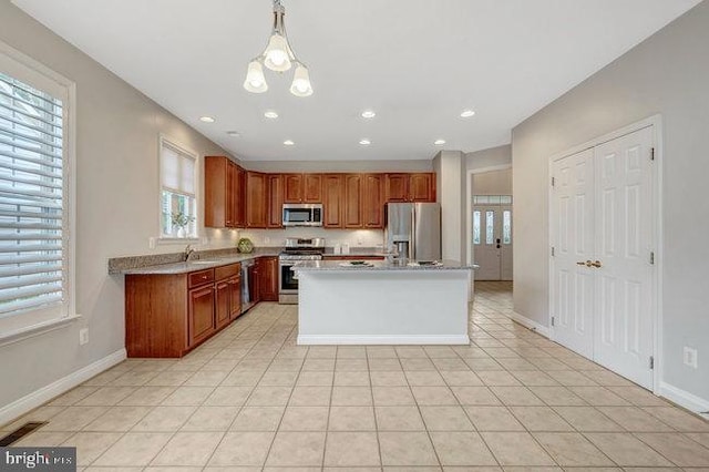13404 Fieldstone Way, Gainesville, VA 20155 - kitchen featuring stainless steel appliances, a sink, plenty of natural light, light countertops, and recessed lighting
