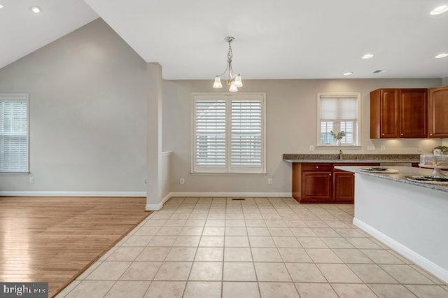 13404 Fieldstone Way, Gainesville, VA 20155 - kitchen with recessed lighting, baseboards, a chandelier, pendant lighting, and light wood-style floors