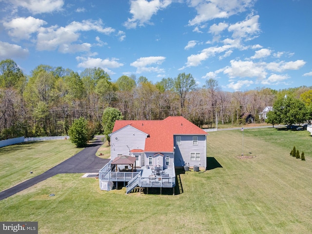 bird's eye view featuring a wooded view