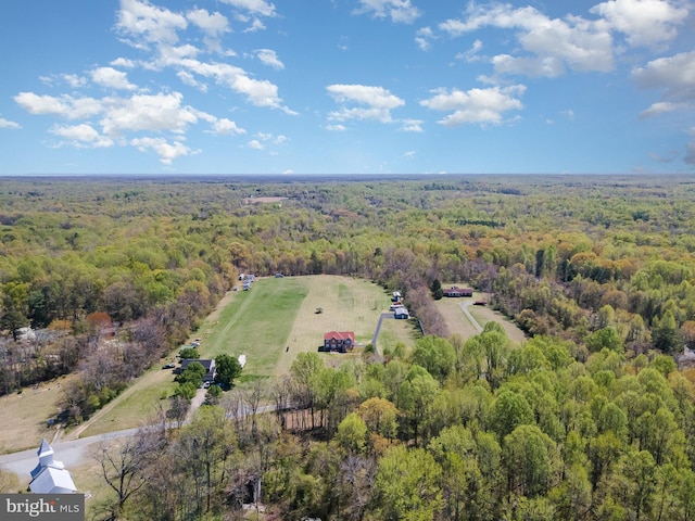 aerial view with a wooded view