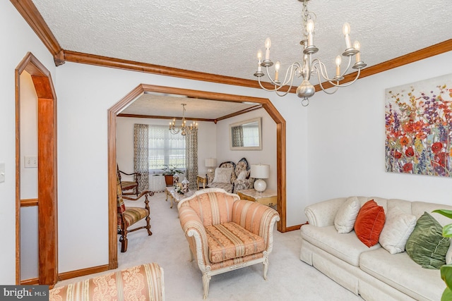 carpeted living room with arched walkways, baseboards, an inviting chandelier, and crown molding