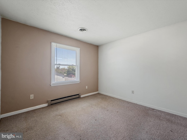carpeted empty room with a baseboard radiator, baseboards, and visible vents