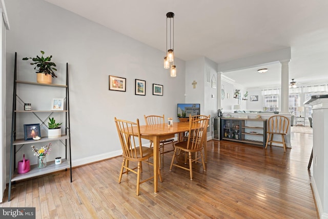 2068 Capstone, Herndon, VA 20170 - dining area with decorative columns, wood-type flooring, and baseboards