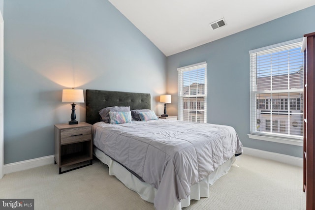 2068 Capstone, Herndon, VA 20170 - bedroom featuring lofted ceiling, light carpet, and baseboards