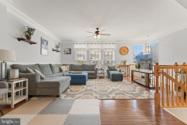 2068 Capstone, Herndon, VA 20170 - living area with ornamental molding, ceiling fan, and hardwood / wood-style flooring