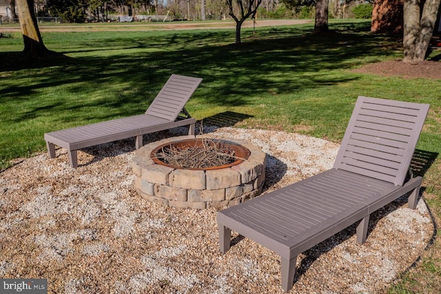 view of patio / terrace featuring a fire pit