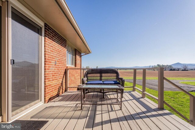 deck with a mountain view