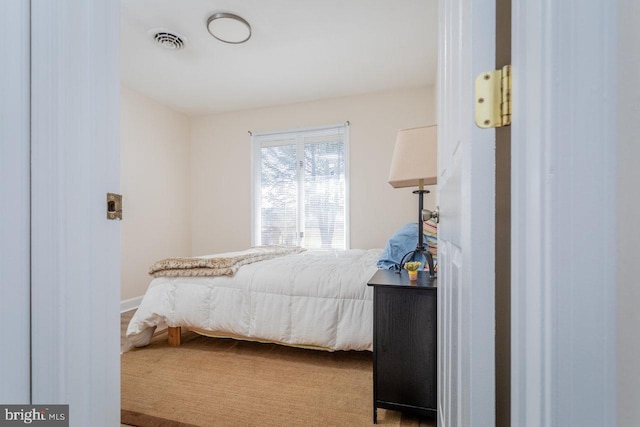 bedroom with visible vents