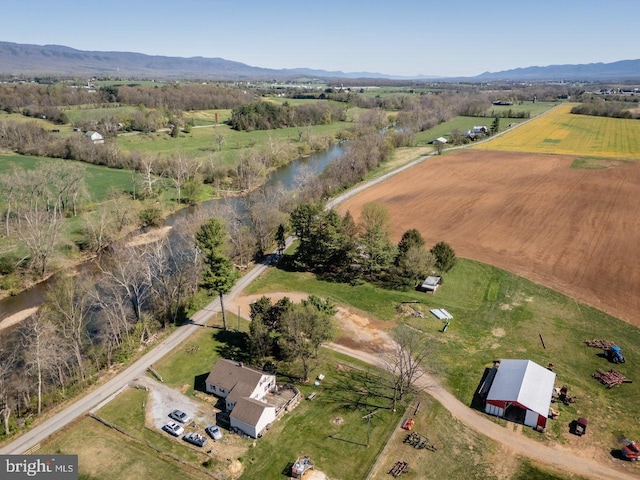 bird's eye view featuring a mountain view and a rural view