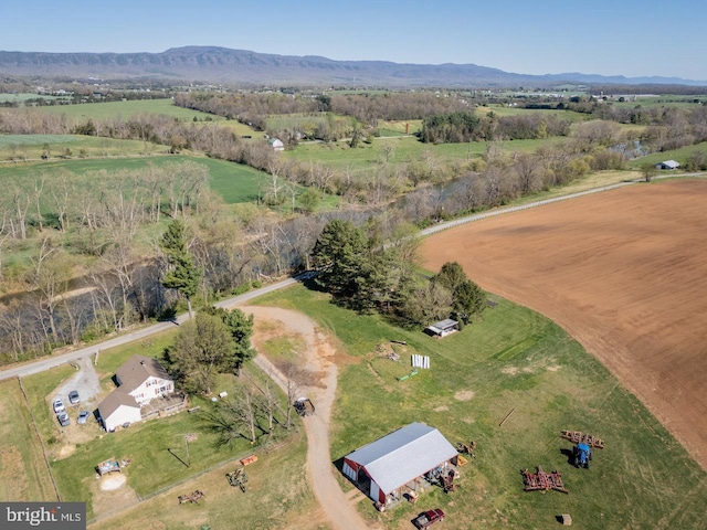 birds eye view of property featuring a rural view and a mountain view