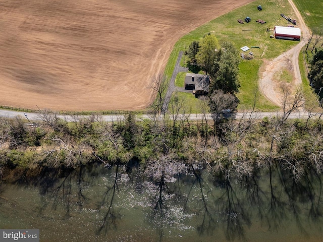 birds eye view of property with a rural view