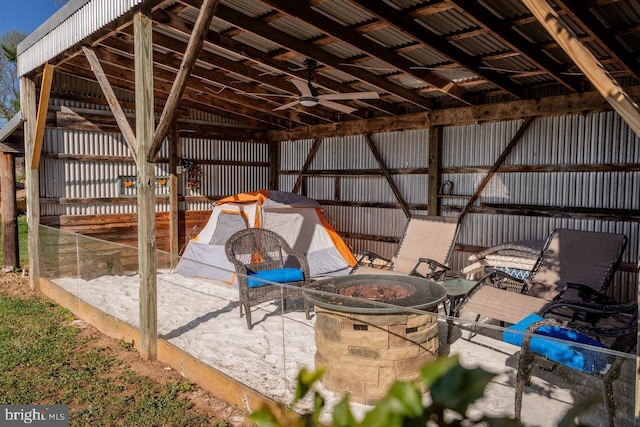 view of patio featuring an outdoor structure and an exterior structure