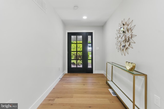 4838 Randolph Dr, Annandale, VA 22003 - doorway to outside with recessed lighting, baseboards, visible vents, and light wood-style flooring