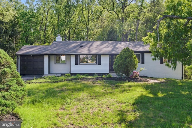 4838 Randolph Dr, Annandale, VA 22003 - single story home with an attached garage, a front yard, and a chimney