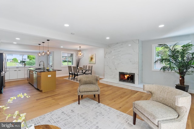 4838 Randolph Dr, Annandale, VA 22003 - living room with recessed lighting, a wealth of natural light, and a fireplace