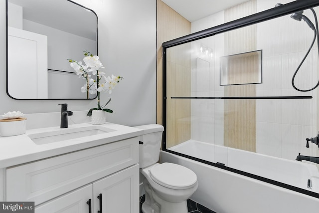 4838 Randolph Dr, Annandale, VA 22003 - full bath featuring vanity, toilet, and shower / bath combination with glass door