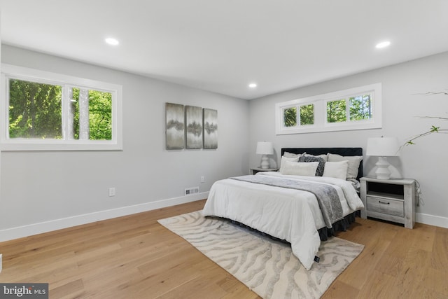 4838 Randolph Dr, Annandale, VA 22003 - bedroom with visible vents, light wood-style flooring, baseboards, and multiple windows