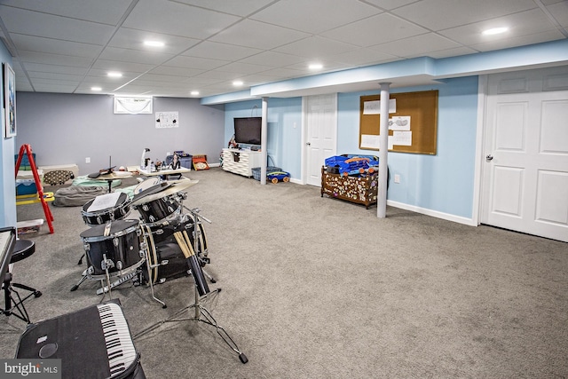 rec room with carpet floors, baseboards, recessed lighting, and a paneled ceiling