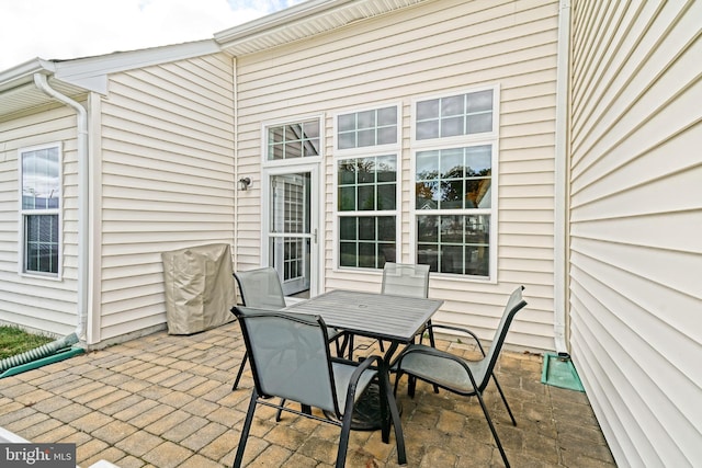 view of patio featuring outdoor dining space