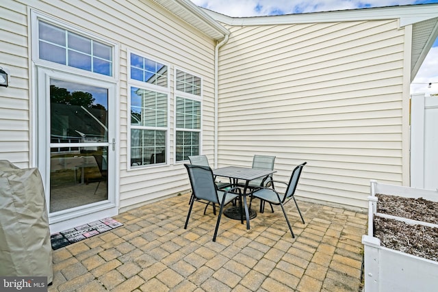 view of patio with outdoor dining area
