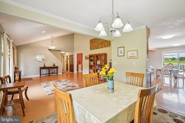 205 S Lehigh Rd, Glassboro, NJ 08028 - dining space with lofted ceiling, wood finished floors, and ornamental molding