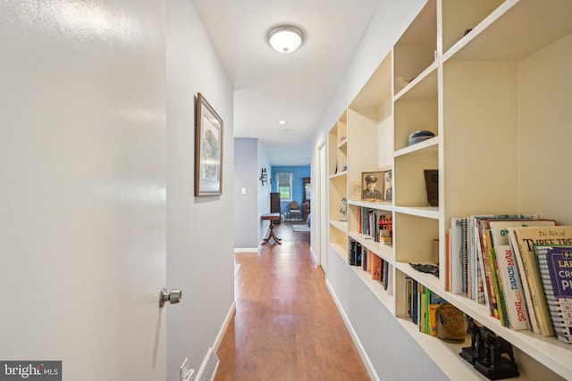 205 S Lehigh Rd, Glassboro, NJ 08028 - hall with recessed lighting, built in features, visible vents, baseboards, and wood finished floors